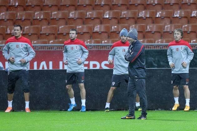 CRO football training - Milan, Italy 15.11.2014., Milan, Italy - Robert Kovac at Short training of Croatian football team during heavy rain on the San Siro stadium. After press conference it was decided that training will be held.  GoranxStanzl PIXSELL