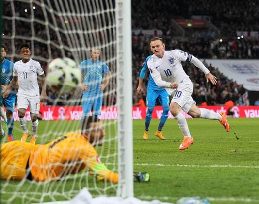 England s Wayne Rooney scoring his sides opening goal - International European Qualifier - England vs Slovenia- Wembley Stadium - London - England - 15th November 2014 - Picture David Klein Sportimage EDITORIAL USE ONLY. No use with unauthorised audio, video, data, fixture lists, club league logos or live services. Online in-match use limited to 120 images, no video emulation. No use in betting, games or single club league player publications.