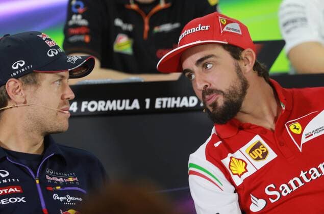 - ABU DHABI, UNITED ARAB EMIRATES: German Sebastian Vettel of Infiniti Red Bull Racing and Spanish Fernando Alonso of Scuderia Ferrari pictured during a press conference, part of preparations ahead of the 2014 Abu Dhabi Grand Prix Formula One race, at the Yas Marina Circuit in Abu Dhabi, United Arab Emirates . GEORGESxDExCOSTER  xpremiumd 38693x