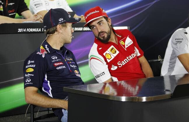 Motorsports: FIA Formula One World Championship 2014, Grand Prix of Abu Dhabi, 1 Sebastian Vettel (GER, Infiniti Red Bull Racing), 14 Fernando Alonso (ESP, Scuderia Ferrari), xHOCHxZWEIx