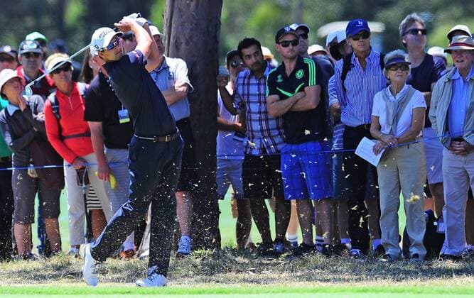 Nov. 21, 2014 - Melbourne, Victoria, Australia - World No. 2 Adam Scott (AUS) plays a shot out of the rough on the second fairway during day 2 of the 2014 Australian Masters at The Metropolitan Golf Club in Melbourne, Australia. Golf 2014 - Australian Masters Day 2 - ZUMAk106
