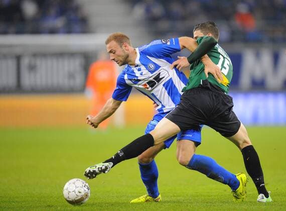 - GENT, BELGIUM: Gent s Laurent Depoitre and Cercle s Pierre Bourdin fight for the ball during the Jupiler Pro League match between KAA Gent and Cercle Brugge, in Gent, Saturday 22 November 2014, on day 16 of the Belgian soccer championship. JOHNxTHYS x04506829x