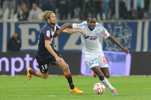 Gilbert Wanga Imbula (Marseille) Jaroslav Plasil (Bordeaux) FOOTBALL : Marseille vs Bordeaux - Ligue 1 - 23 11 2014 N.LeGouic FEP Panoramic 