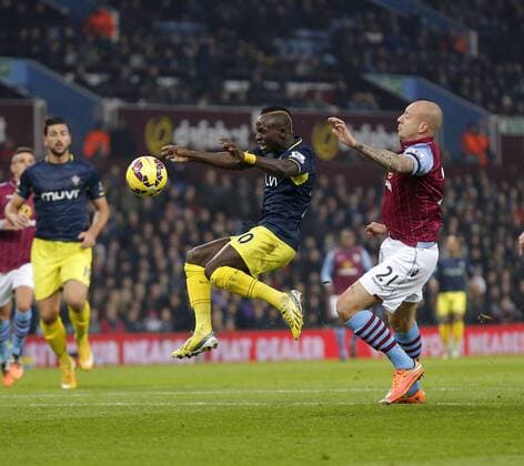 Sadio Mane of Southampton competes withal Hutton of Villa - Football - Barclays Premier League - Aston Villa vs Southampton - Villa Park Birmingham - Season 2014 2015 - 24th November 2015 - Photo Malcolm Couzens Sportimage EDITORIAL USE ONLY. No use with unauthorised audio, video, data, fixture lists, club league logos or live services. Online in-match use limited to 120 images, no video emulation. No use in betting, games or single club league player publications.