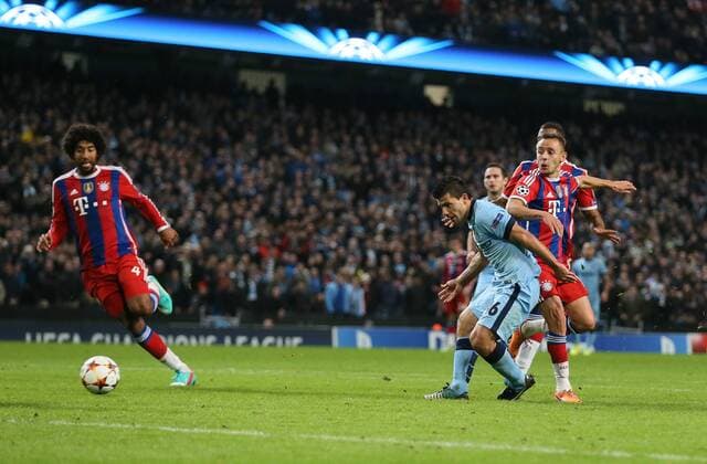 Sergio Kun Aguero of Manchester City scores the third goal - UEFA Champions League group E - Manchester City vs Bayern Munich - Etihad Stadium - Manchester - England - 25rd November 2014 - Picture Simon Bellis Sportimage EDITORIAL USE ONLY. No use with unauthorised audio, video, data, fixture lists, club league logos or live services. Online in-match use limited to 120 images, no video emulation. No use in betting, games or single club league player publications.