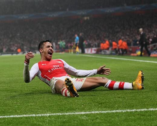 Arsenal s Alexis Sanchez celebrates scoring his sides second goal UEFA Champions League- Arsenal vs Borussia Dortmund- Emirates Stadium - England - 26th November 2014 - EDITORIAL USE ONLY. No use with unauthorised audio, video, data, fixture lists, club league logos or live services. Online in-match use limited to 120 images, no video emulation. No use in betting, games or single club league player publications.