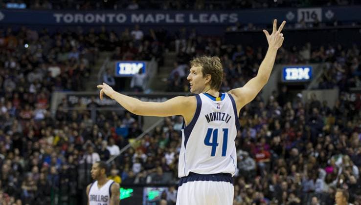 Dirk Nowitzki of Dallas Mavericks celebrates during the NBA Basketball Herren USA game against Toronto Raptors at Air Canada Center in Toronto, Canada, Nov. 28, 2014. Raptors lost 102-106. (Xinhua Zou Zheng) (SP)CANADA-TORONTO-NBA-MAVERICKS VS RAPTORS 