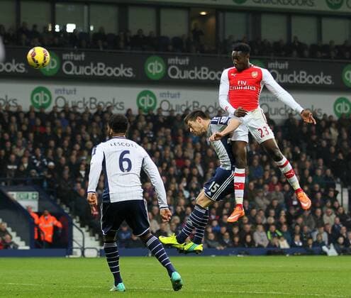 Arsenal s Danny Welbeck scoring his sides opening goal - Barclays Premier League - West Bromwich Albion vs FC Arsenal London - The Hawthorns - England - 29th November 2014 - EDITORIAL USE ONLY. No use with unauthorised audio, video, data, fixture lists, club league logos or live services. Online in-match use limited to 120 images, no video emulation. No use in betting, games or single club league player publications.