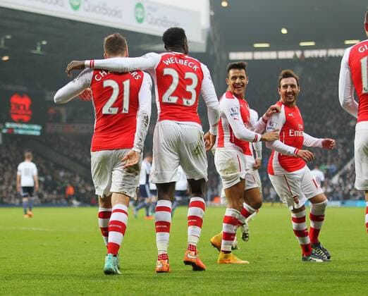 Arsenal s Danny Welbeck celebrates scoring his sides opening goal with Alexis Sanchez and Santi Cazorla - Barclays Premier League - West Bromwich Albion vs FC Arsenal London - The Hawthorns - England - 29th November 2014 - EDITORIAL USE ONLY. No use with unauthorised audio, video, data, fixture lists, club league logos or live services. Online in-match use limited to 120 images, no video emulation. No use in betting, games or single club league player publications.
