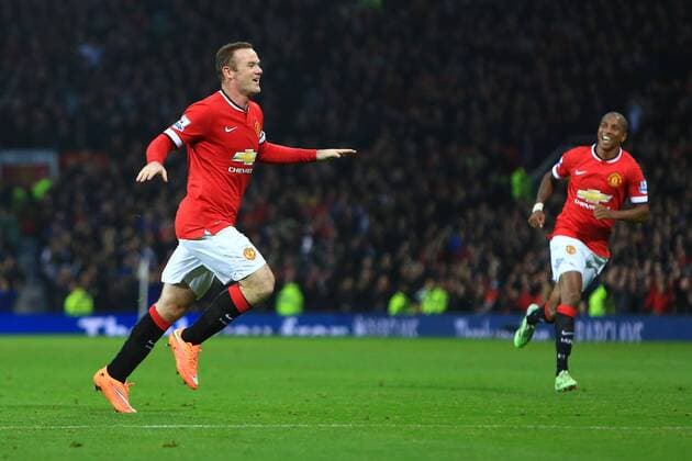 Wayne Rooney of Manchester United celebrates scoring his sides second goal - Manchester United (ManU) vs. Hull City - Barclay s Premier League - Old Trafford - Manchester - 29 11 2014 - EDITORIAL USE ONLY. No use with unauthorised audio, video, data, fixture lists, club league logos or live services. Online in-match use limited to 120 images, no video emulation. No use in betting, games or single club league player publications.