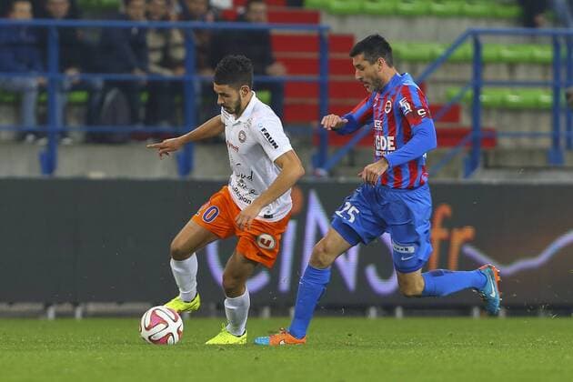 Julien Feret (Caen) vs Morgan Sanson (Montpellier) FOOTBALL : Caen vs Montpellier - Ligue 1 - 29 11 2014 - GwendolineLeGoff Panoramic 