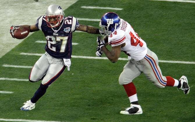 Feb. 3, 2008 - The New England Patriots Ellis Hobbs (27) returns an interception and tires to evade the New York Giants Ahmad Bradshaw (44) in the first half of Super Bowl XLII at University of Phoenix Stadium in Glendale, Arizona, on Sunday, February 3, 2008. (Mark Cornelison MCT) News Archive - Feb. 3, 2008 - ZUMAm67_