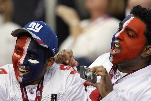 Feb. 3, 2008 - The New York Giants fans Sujit John and Nidhish Varughese cheer their team at Super Bowl XLII at University of Phoenix Stadium in Glendale, Arizona, on Sunday, February 3, 2008, where the New England Patriots are trying to be the second undefeated team in NFL American Football Herren USA history. (Gary W. Green MCT) News Archive - Feb. 3, 2008 - ZUMAm67_