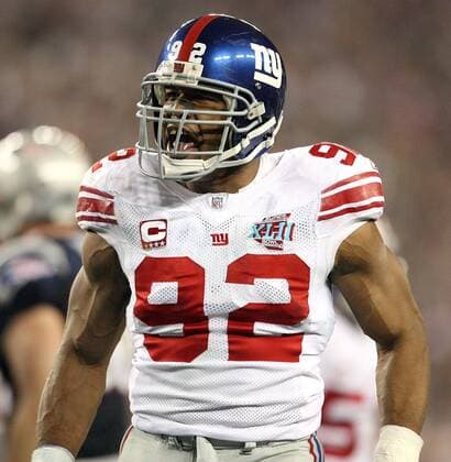 Feb. 3, 2008 - The New York Giants Michael Strahan (92) celebrates after hitting the New England Patriots Laurence Maroney for a loss in the first half of Super Bowl XLII at University of Phoenix Stadium in Glendale, Arizona, on Sunday, February 3, 2008. (Gary W. Green MCT) News Archive - Feb. 3, 2008 - ZUMAm67_