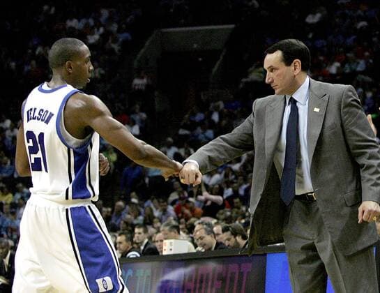 March 14, 2008 - Duke team captain DeMarcus Nelson bumps fists with coach Mike Krzyzewski near the end of Duke s 82-70 win over Georgia Tech in the second round game of an ACC men s basketball tournament game at the Charlotte Bobcats Arena on Friday, March 14, 2008, in Charlotte, North Carolina. Duke won 82-70. (Ted Richardson Raleigh News & Observer MCT) News Archive - March 14, 2008 - ZUMAm67_
