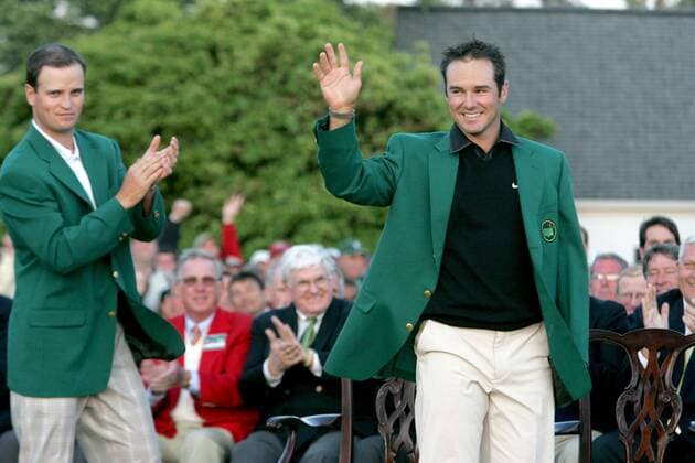 April 13, 2008 - Zach Johnson, left, the 2007 Masters champion, claps after putting the green jacket on Trevor Immelman during the green jacket presentation after the final round of the Masters tournament at Augusta National Golf Club, Sunday, April 13, 2008, in Augusta, Georgia. (Gerry Melendez The State MCT) News Archive - April 13, 2008 - ZUMAm67_