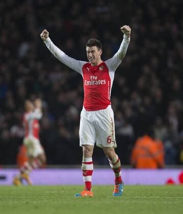 Aktuell FuÃŸball, England, Premier League, FC Arsenal - FC Southampton 03.12.2014. London, England. Premier League. Arsenal versus Southampton. Arsenal s Laurent Koscielny celebrates his sides late goal. xNigelxCookex  ActionPlus11580776
