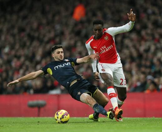 Arsenal s Danny Welbeck tussles with Southampton s Shane Long Barclays Premier League- Arsenal vs Southampton - Emirates Stadium - England - 3rd December 2014 - Picture David Klein Sportimage EDITORIAL USE ONLY. No use with unauthorised audio, video, data, fixture lists, club league logos or live services. Online in-match use limited to 120 images, no video emulation. No use in betting, games or single club league player publications.