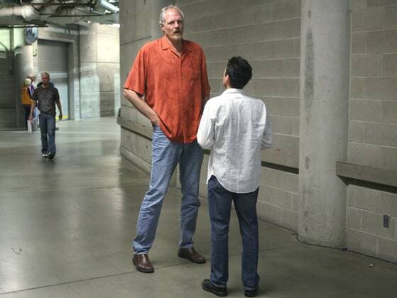 May 16, 2008 - Mark Eaton, a former center for the Utah Jazz standing at 7 4 , patiently answers questions from a reporter at Energy Solutions Arena in Salt Lake City, on May 16, 2008. (Michael Goulding Orange County Register MCT) News Archive - May 16, 2008 - ZUMAm67_