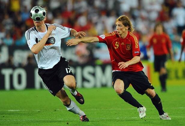 June 29, 2008 - Germany s Per Mertesacker (left) and Spain s Fernando Torres battle for the ball during the UEFA EURO EM Europameisterschaft Fussball 2008 Final match at Ernst Happel Stadion in Vienna, Austria, Sunday, June 29, 2008. Spain won 1-0. - ZUMAm67_