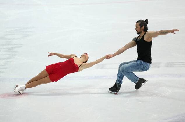 Figure skating Eiskunstlauf - The Golden Spin - Pairs 04.12.2014., Zagreb, Croatia - Figure skating competition The Golden Spin. Pairs Olga Bestandigova - Ilhan Mansiz from Turkey. Ilhan Mansiz is former turkish football player.  IgorxKralj PIXSELL