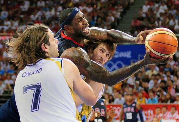 Aug. 22, 2008 - LeBron James of the United States tries to drive through the defense of Fabricio Raul Jesus Oberto (7) and Andres Marcelo Nocioni of Argentina in basketball semifinals on Friday, August 22, 2008, in the Games of the XXIX Olympiad in Beijing, China. (Jeff Siner Charlotte Observer MCT) News Archive - Aug. 22, 2008 - ZUMAm67_