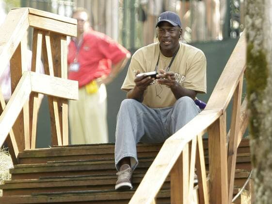 Sept. 20, 2008 - Michael Jordan watched the action from the top of the steps leading to 14 tee and watched the action on his small television set during the second day of the 37th Ryder Cup at Valhalla Golf Cub on Saturday, September 20, 2008, in Louisville, Kentucky. (Mark Cornelison Lexington Herald-Leader MCT) News Archive - Sept. 20, 2008 - ZUMAm67_