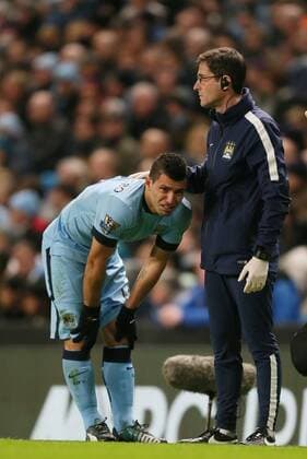 Sergio Kun Aguero of Manchester City bursts into tears following his injury - Barclays Premier League - Manchester City vs Everton - Etihad Stadium - Manchester - England - 6th December 2014 - Picture Simon Bellis Sportimage EDITORIAL USE ONLY. No use with unauthorised audio, video, data, fixture lists, club league logos or live services. Online in-match use limited to 120 images, no video emulation. No use in betting, games or single club league player publications.