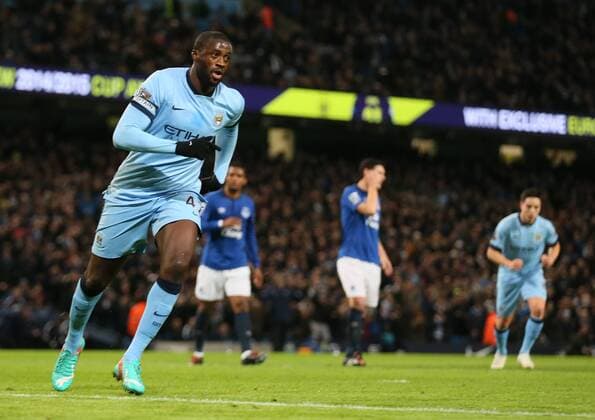 Yaya Toure of Manchester City celebrates scoring the first goal - Barclays Premier League - Manchester City vs Everton - Etihad Stadium - Manchester - England - 6th December 2014 - Picture Simon Bellis Sportimage EDITORIAL USE ONLY. No use with unauthorised audio, video, data, fixture lists, club league logos or live services. Online in-match use limited to 120 images, no video emulation. No use in betting, games or single club league player publications.