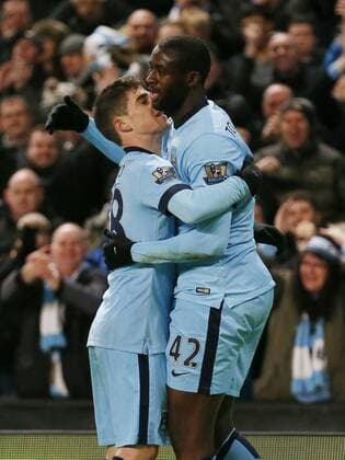 Yaya Toure of Manchester City celebrates scoring the first goal - Barclays Premier League - Manchester City vs Everton - Etihad Stadium - Manchester - England - 6th December 2014 - Picture Simon Bellis Sportimage EDITORIAL USE ONLY. No use with unauthorised audio, video, data, fixture lists, club league logos or live services. Online in-match use limited to 120 images, no video emulation. No use in betting, games or single club league player publications.