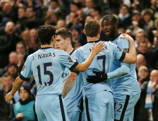 Yaya Toure of Manchester City scores the first goal from the penalty spot - Barclays Premier League - Manchester City vs Everton - Etihad Stadium - Manchester - England - 6th December 2014 - Picture Simon Bellis Sportimage EDITORIAL USE ONLY. No use with unauthorised audio, video, data, fixture lists, club league logos or live services. Online in-match use limited to 120 images, no video emulation. No use in betting, games or single club league player publications.