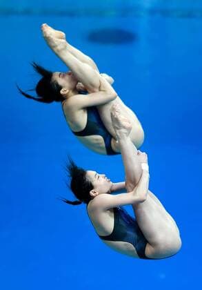 Aug. 10, 2008 - China s Jingjing Guo and Minxia Wu win gold in the 3-meter Synchronized Springboard on Sunday, August 10, 2008, in the Games of the XXIX Olympiad in Beijing, China. (David Eulitt Kansas City Star MCT) News Archive - Aug. 10, 2008 - ZUMAm67_