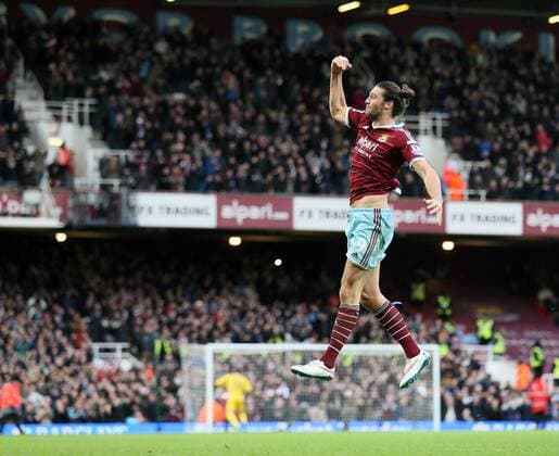 West Ham s Andy Carroll celebrates scoring his sides second goal Barclays Premier League- West Ham United vs Swansea City - Upton Park - England - 7th December 2014 - Picture David Klein Sportimage EDITORIAL USE ONLY. No use with unauthorised audio, video, data, fixture lists, club league logos or live services. Online in-match use limited to 120 images, no video emulation. No use in betting, games or single club league player publications.