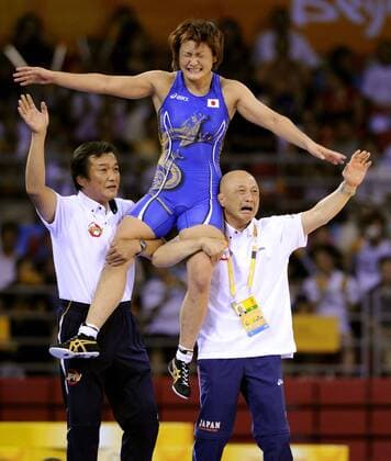 Aug. 17, 2008 - Coaches lift Kaori Icho of Japan on their shoulders to celebrate her gold in the 63kg division on Sunday, August 17, 2008, in the Games of the XXIX Olympiad in Beijing, China. (Mark Reis Colorado Springs Gazette MCT) News Archive - Aug. 17, 2008 - ZUMAm67_