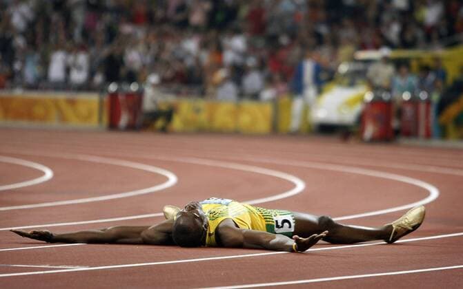 Aug. 20, 2008 - Usain Bolt of Jamaica celebrates a gold medal and world record in the 200 meters on Wednesday, August 20, 2008, in the Games of the XXIX Olympiad in Beijing, China. (Tom Fox Dallas Morning News MCT) News Archive - Aug. 20, 2008 - ZUMAm67_