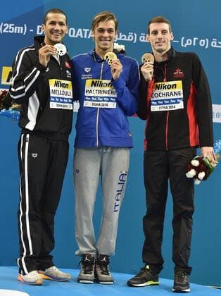 Ousama MELLOULI Tunisia Silver Medal, Gregorio PALTRINIERI Italia Gold Medal, Ryan COCHRANE CAN Bronze Medal Men s 1500m Freestyle Doha Qatar 07-12-2014 Hamad Aquatic Centre, 12th FINA World Swimming Championships (25m). andreaxstaccioli
