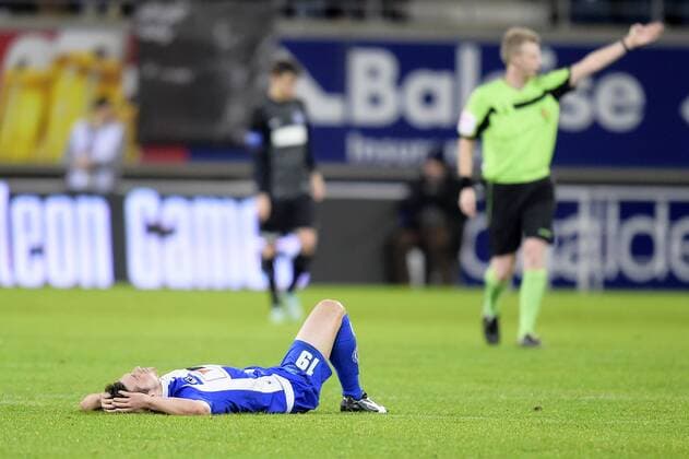 - GENT, BELGIUM: Gent s Brecht Dejaegere lies injured on the ground during the Jupiler Pro League match between KAA Gent and KRC Genk, in Gent, Sunday 07 December 2014, on day 18 of the Belgian soccer championship. YORICKxJANSENS x04516893x