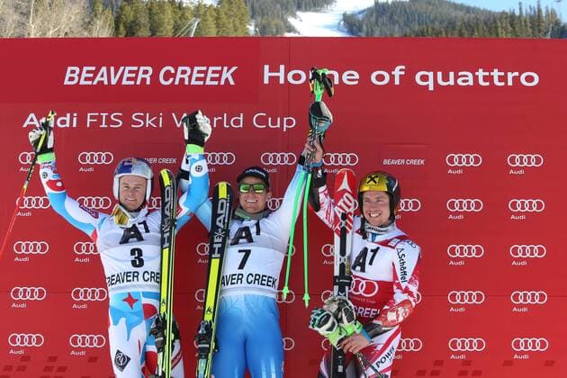 ALPINE SKIING - FIS WC Beaver Creek BEAVER CREEK,COLORADO,USA,07.DEC.14 - ALPINE SKIING - FIS World Cup, giant slalom men, award ceremony. Image shows the rejoicing of Alexis Pinturault (FRA), Ted Ligety (USA) and Marcel Hirscher (AUT).