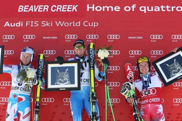 ALPINE SKIING - FIS WC Beaver Creek BEAVER CREEK,COLORADO,USA,07.DEC.14 - ALPINE SKIING - FIS World Cup, giant slalom men, award ceremony. Image shows the rejoicing of Alexis Pinturault (FRA), Ted Ligety (USA) and Marcel Hirscher (AUT). Keywords: trophy.