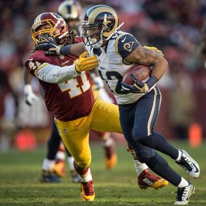 Dec 7, 2014 - Landover, Maryland, U.S. - St. Louis Rams wide receiver STEDMAN BAILEY (12) stiff arms Washington Redskins strong safety PHILLIP THOMAS (41) as the St. Louis Rams beat the Washington Redskins 24-0 at FedEx Field. NFL American Football Herren USA 2014 - Rams beat Redskins 24-0  - ZUMA