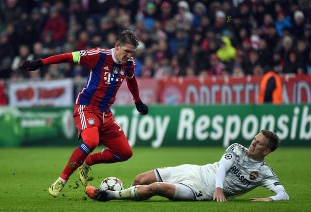 10.12.2014, xjhx, Fussball Champions League, FC Bayern Muenchen - ZSKA Moskau, v.l. Bastian Schweinsteiger (FC Bayern Muenchen), Pontus Wernbloom (ZSKA Moskau)