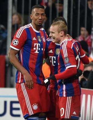 10.12.2014, xjhx, Fussball Champions League, FC Bayern Muenchen - ZSKA Moskau, v.l. Jerome Boateng (FC Bayern Muenchen), Bastian Schweinsteiger (FC Bayern Muenchen), Sebastian Rode (FC Bayern Muenchen) Torjubel, Goal celebration, celebrate the goal 2:0