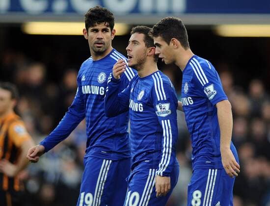 Football - 2014 2015 Premier League - Chelsea FC vs. Hull City Chelsea s Eden Hazard celebrates scoring his first half goal with Oscar and Diego Costa at Stamford Bridge. 