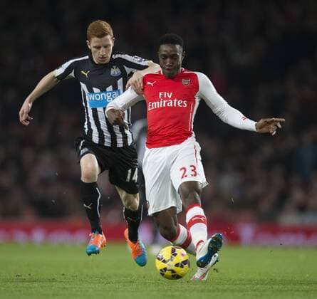 13.12.2014. London, England. Premier League. Arsenal FC versus Newcastle United. Arsenal s Danny Welbeck is closed down by Newcastle United s Jack Colback. xNigelxCookex  ActionPlus11582722