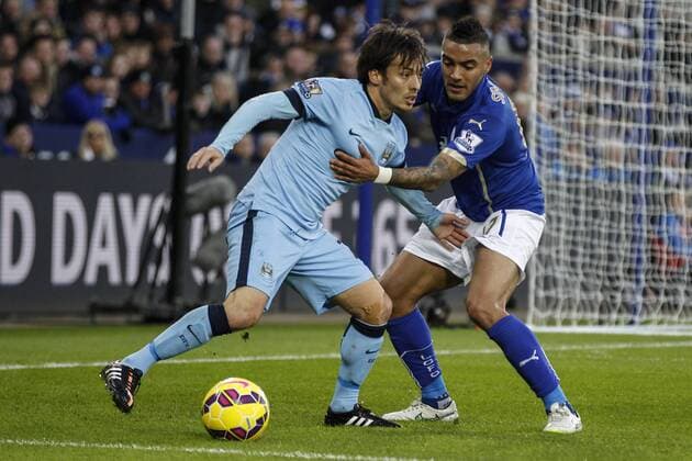 13.12.2014. Leicester, England. Premier League. Leicester versus Manchester City. Gael Clichy of Manchester City and Riyad Mahrez of Leicester City tussle on the edge of the box. Final score: Leicester City 0-1 Manchester City. xJohnxKirkpatrickx  ActionPlus11582723