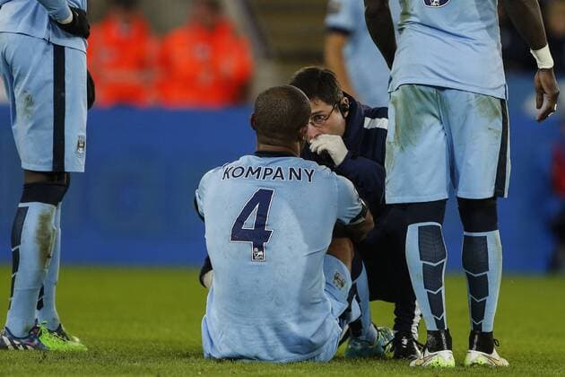 13.12.2014. Leicester, England. Premier League. Leicester versus Manchester City. Vincent Kompany of Manchester City receives treatment before leaving the field. Final score: Leicester City 0-1 Manchester City. xJohnxKirkpatrickx  ActionPlus11582731