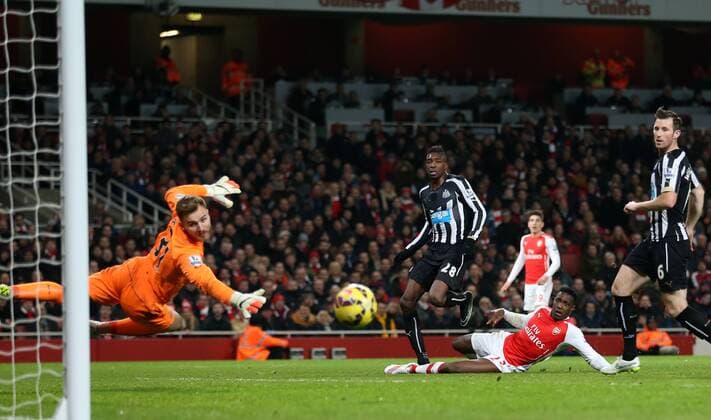 Arsenal s Danny Welbeck sees his shot go just wide Barclays Premier League- Arsenal FC vs Newcastle United - Emirates Stadium - England - 13th December 2014 - EDITORIAL USE ONLY. No use with unauthorised audio, video, data, fixture lists, club league logos or live services. Online in-match use limited to 120 images, no video emulation. No use in betting, games or single club league player publications.