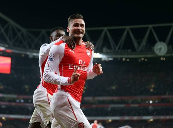 Arsenal s Olivier Giroud celebrates scoring his sides third goal Barclays Premier League- Arsenal FC vs Newcastle United - Emirates Stadium - England - 13th December 2014 - EDITORIAL USE ONLY. No use with unauthorised audio, video, data, fixture lists, club league logos or live services. Online in-match use limited to 120 images, no video emulation. No use in betting, games or single club league player publications.