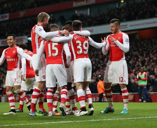 Arsenal s Olivier Giroud celebrates scoring his sides third goal Barclays Premier League- Arsenal FC vs Newcastle United - Emirates Stadium - England - 13th December 2014 - EDITORIAL USE ONLY. No use with unauthorised audio, video, data, fixture lists, club league logos or live services. Online in-match use limited to 120 images, no video emulation. No use in betting, games or single club league player publications.
