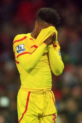 Aktuell Fußball, England, Premier League, Manchester United - FC Liverpool Raheem Sterling of Liverpool looks dejected following defeat - Manchester United ManU vs. Liverpool - Barclay s Premier League - Old Trafford - Manchester - 14 12 2014 Pic Philip Oldham Sportimage EDITORIAL USE ONLY. No use with unauthorised audio, video, data, fixture lists, club league logos or live services. Online in-match use limited to 120 images, no video emulation. No use in betting, games or single club league player publications.
